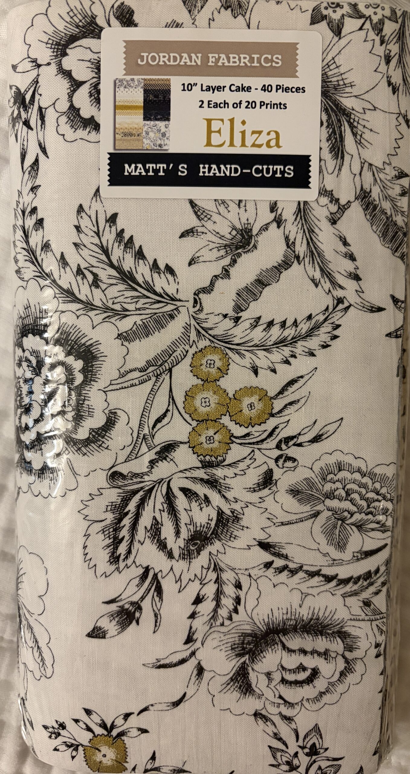 Jordan Fabrics layer cake, "Eliza" collection in black, white,  tan and gold metallic